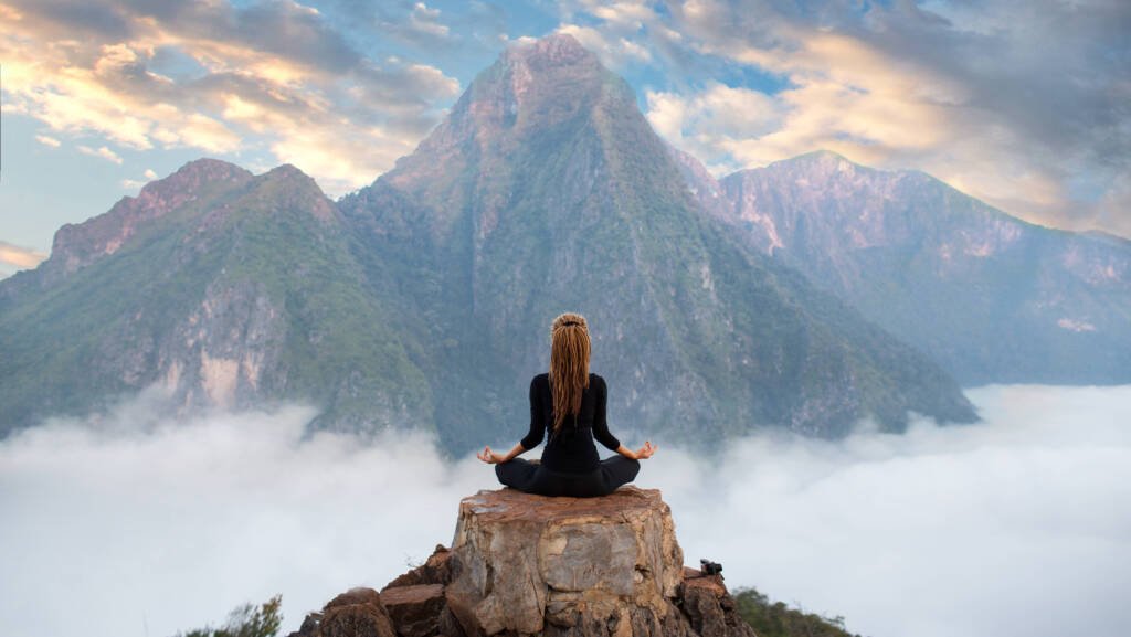 WomanSerenity,And,Yoga,Practicing,At,Mountain,Range,meditation