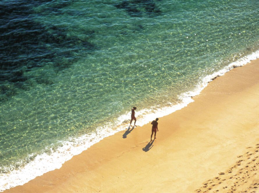 2.Persons.Walking.On Long.Beach. Portugal